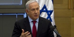 Israel's PM Netanyahu speaks during a Likud party meeting at the parliament in Jerusalem