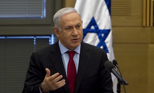 Israel's PM Netanyahu speaks during a Likud party meeting at the parliament in Jerusalem