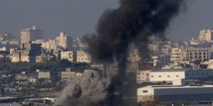 Smoke rises after Israeli air strike in Gaza