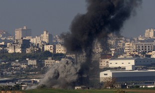 Smoke rises after Israeli air strike in Gaza