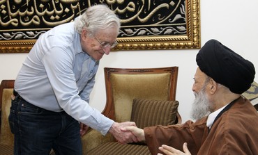 Grand Ayatollah Sayyed Mohammed Hussein Fadlallah shakes hands with Noam Chomsky at his office in Beirut's suburbs