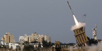 An Iron Dome launcher fires an interceptor rocket in the southern city of Ashdod